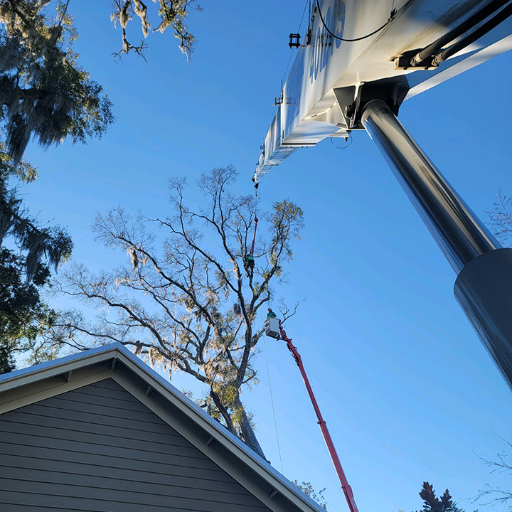 Crane truck working on house building in Beaufort SC