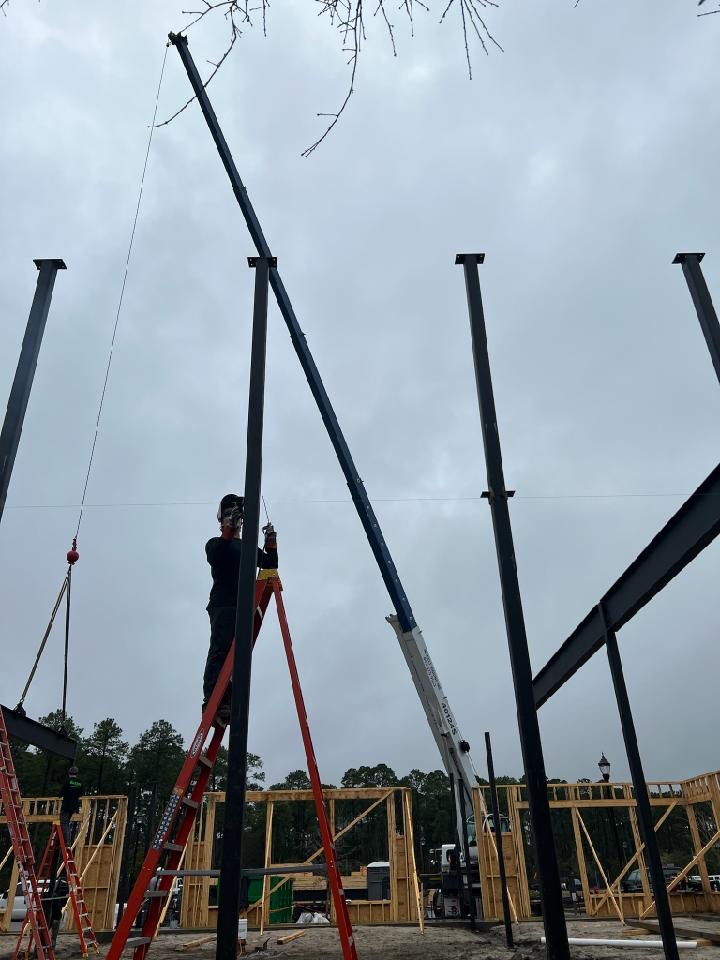 Crane truck working on house